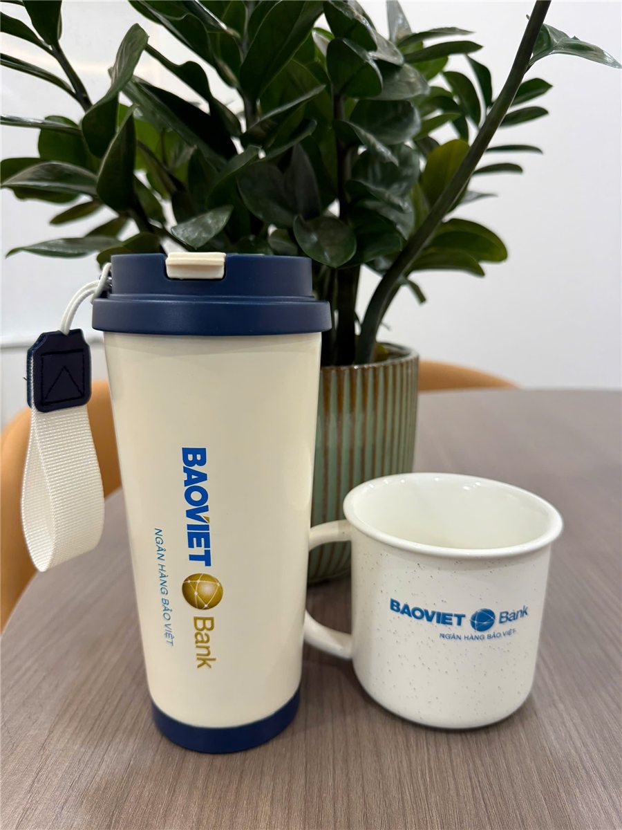 BAOVIET Bank insulated bottle and ceramic mug matched in navy and the bank logo