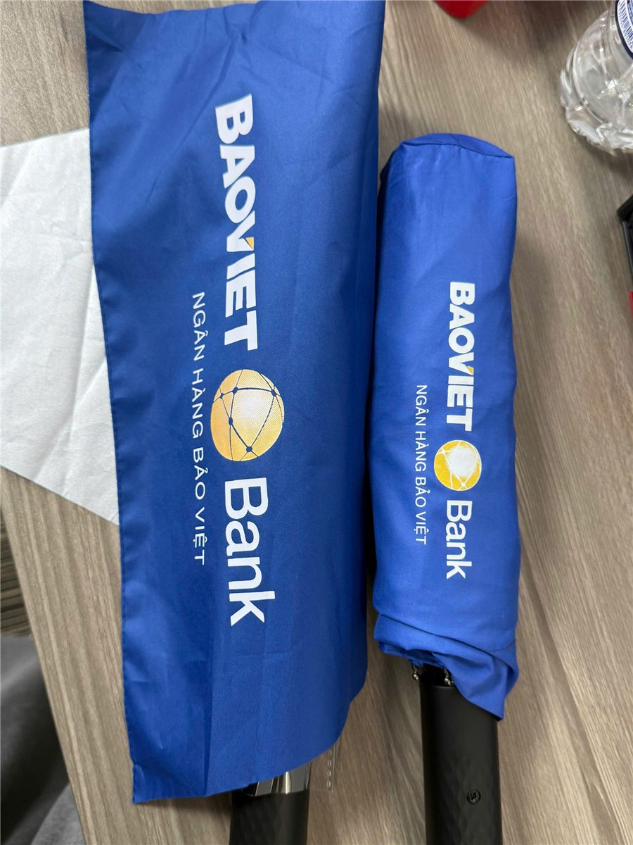 BAOVIET Bank folding umbrella with a sleeve printed with the logo and bank name