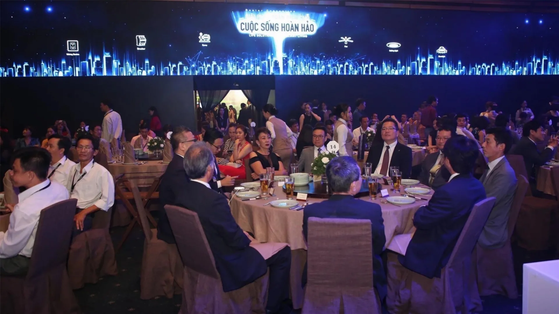 Panasonic dealer conference ballroom with a long LED wall showing the brilliant living key visual