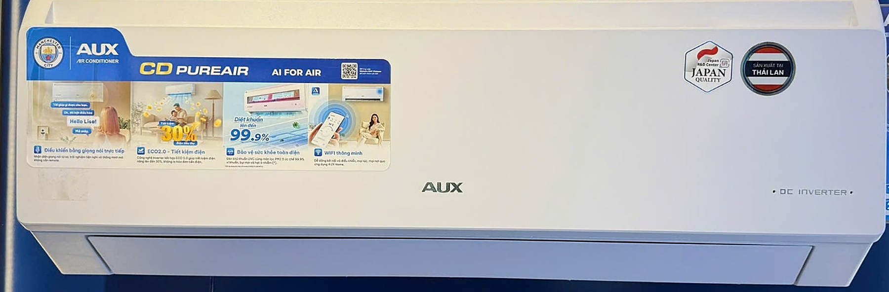 AUX CD PureAir air conditioner on display with feature information including voice control and wifi