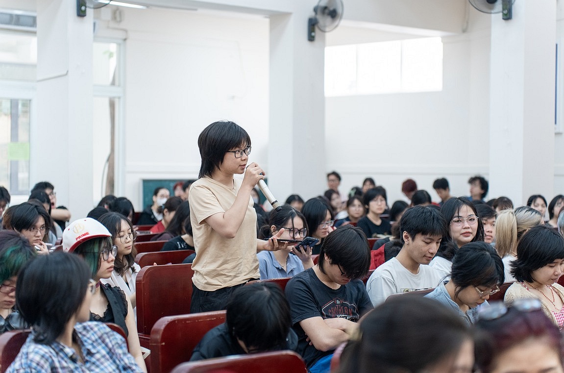 A student asking the organizers and judges a question.